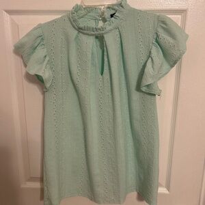 Keyhole ruffled sleeveless top